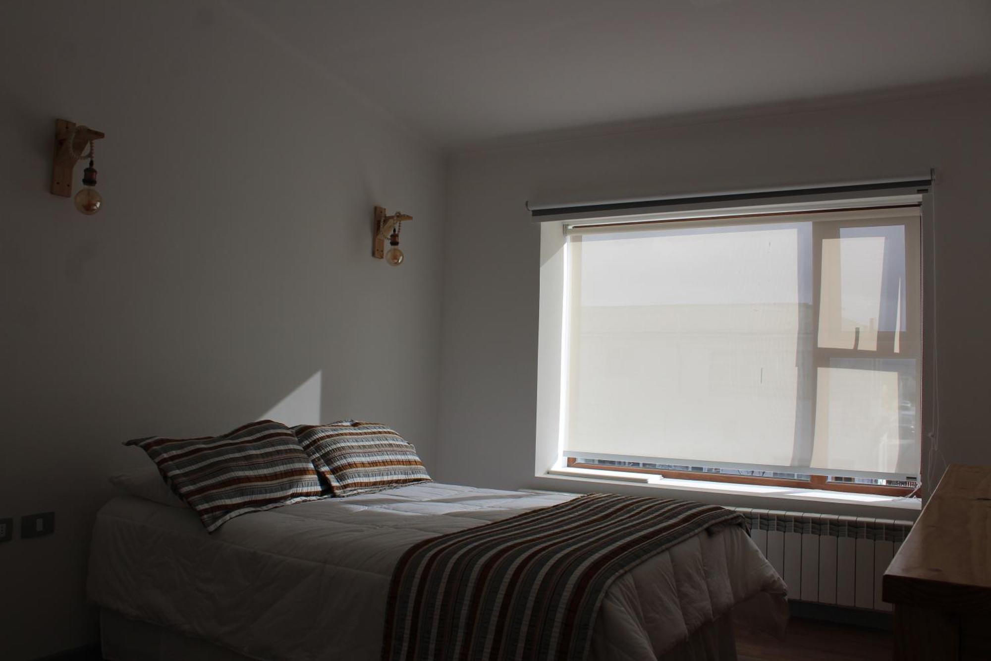 Hostal Alamo Patagonico Пуэрто-Наталес Экстерьер фото