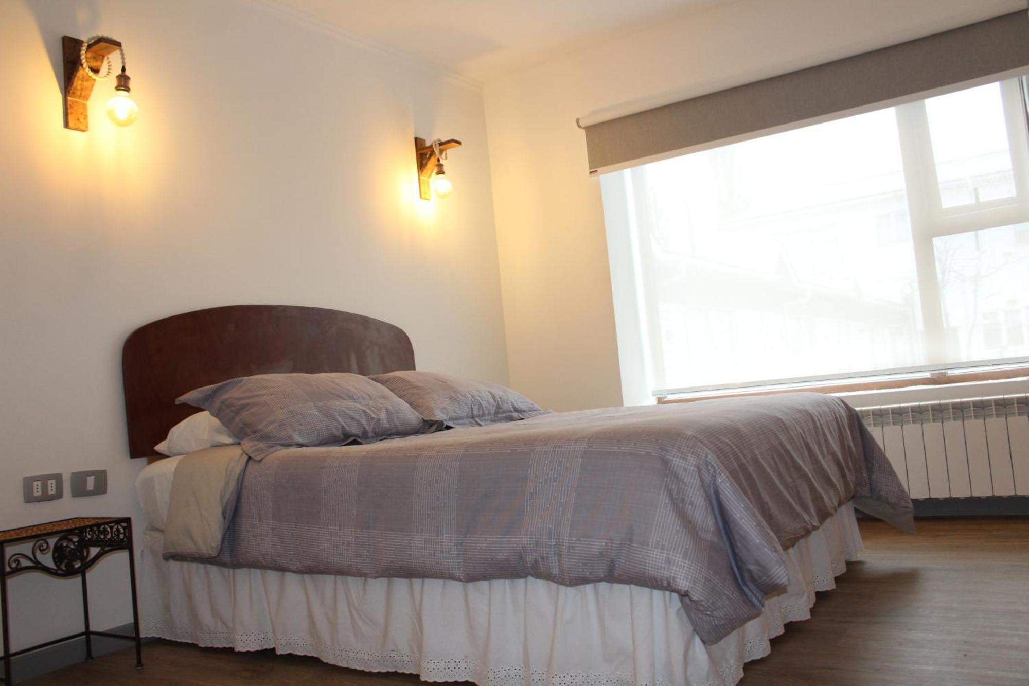 Hostal Alamo Patagonico Пуэрто-Наталес Экстерьер фото