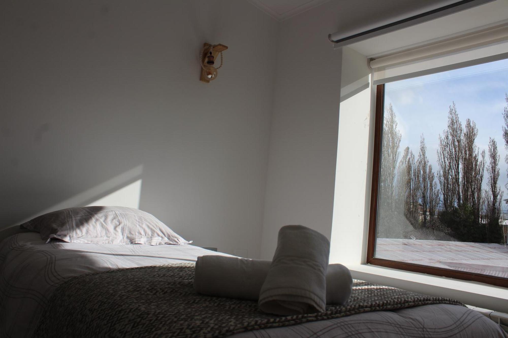 Hostal Alamo Patagonico Пуэрто-Наталес Экстерьер фото