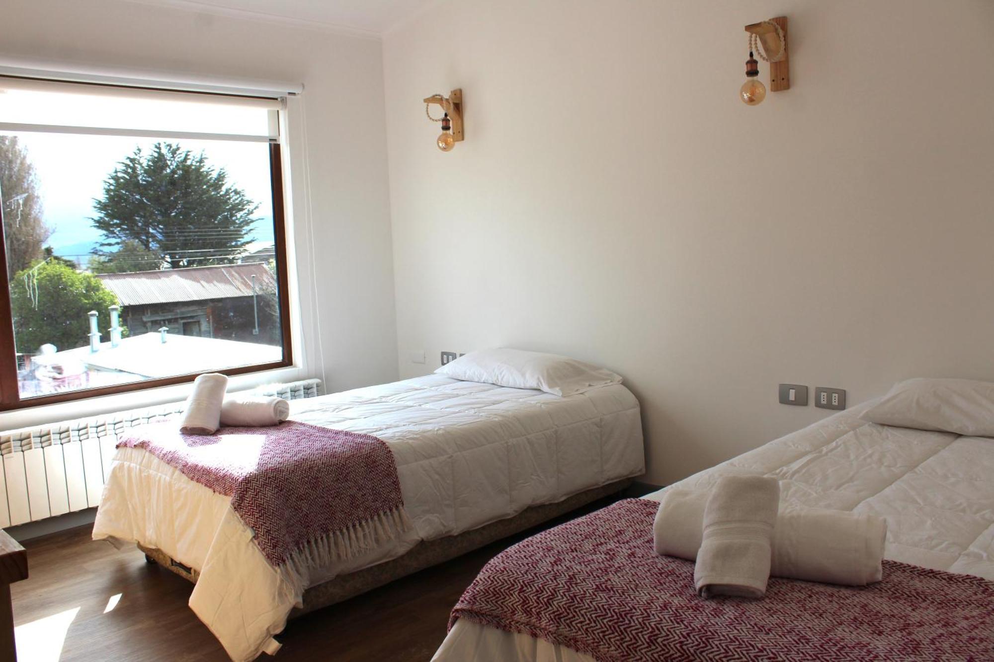 Hostal Alamo Patagonico Пуэрто-Наталес Экстерьер фото