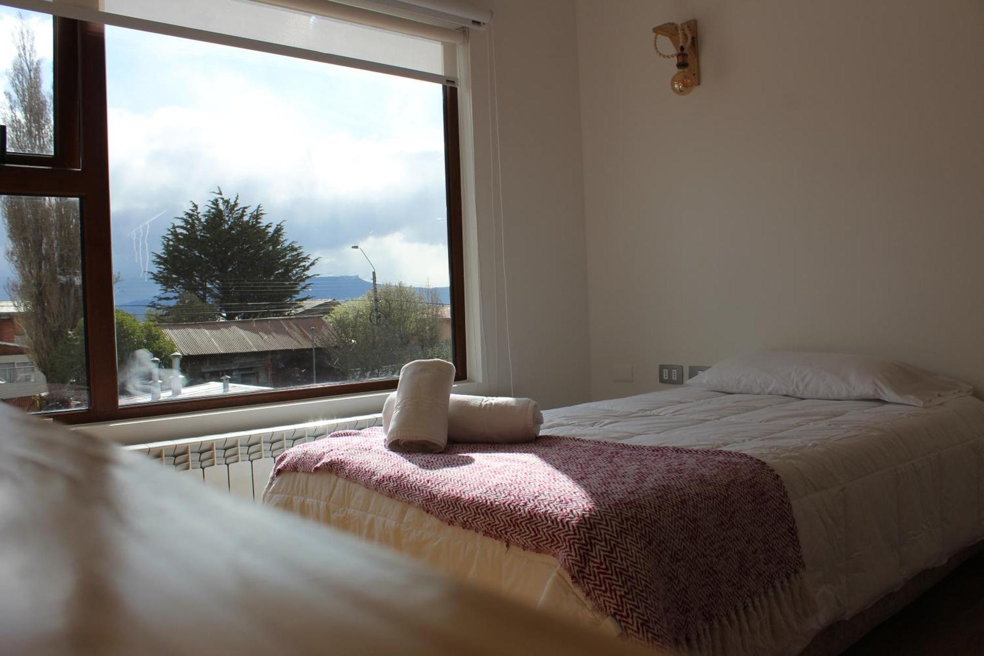 Hostal Alamo Patagonico Пуэрто-Наталес Экстерьер фото